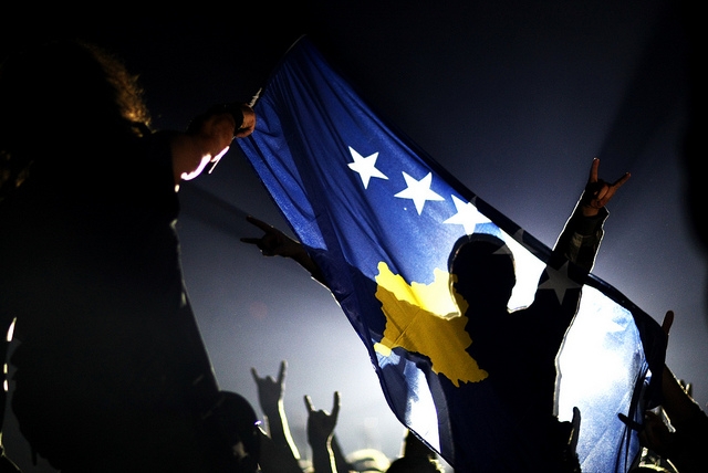 Kosovar Flag [Photo: TROJA - The Young Ghettopeans [LIVE CONCERT 06 Nov 2010] by Rasha., on Flickr]